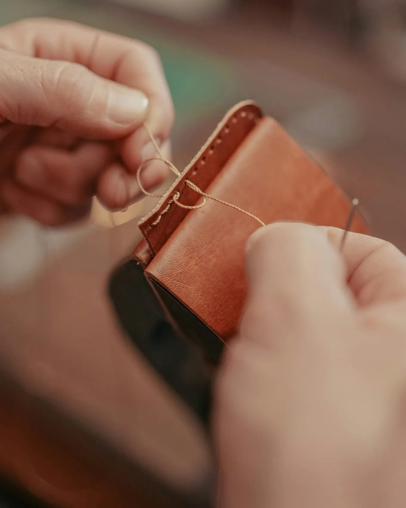 Leather, cut and stitched by hand